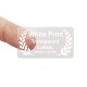 38.1mm x 21.2mm transparent label on a finger with white print