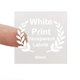 Square transparent label with white print reading 40mm, held between two fingers. Features a laurel wreath design and is ideal for customised or personalised branding on small product packaging or gift items.