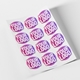 Sheet of multiple custom Your Logo heat transfer decals in vibrant pink and purple, perfect for personalised branding or customised clothing projects.