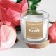 30mm brown kraft label with white print on a white candle with red rose petals