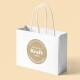 64mm white print brown kraft labels on a white shopping bag with yellow background