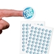 Transparent custom circle label sticker with a blue and white logo, shown on a fingertip, alongside two sheets filled with multiple identical stickers. Ideal for personalised branding or product labelling.