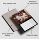 Personalised wall calendar open to December 2026, featuring a festive family photo above a black calendar grid. The calendar includes a sturdy greyboard backing, 170gsm silk paper, and a wire binding with an easy hanging hook. Annotations highlight the durable and user-friendly design elements.