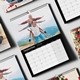 Wall calendar open to September 2026, featuring a cheerful family photo of a father giving a piggyback ride to two children against a mountain backdrop. The calendar has a black layout with a visible metal hook for easy hanging, surrounded by other similar photo calendar pages.
