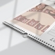 Close-up of the wire binding and hanging hook on a personalised A4 family planner calendar.
