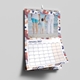 Personalised A4 wall calendar for 2027 with a custom family photograph and colourful patterned border
