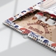 Close-up of a personalised A4 photo calendar showing the patterned border, wire binding and hanging hook