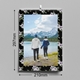 Floral-themed wall calendar featuring a couple holding hands by a lake with snowy mountains in the background. Clearly marked dimensions show the calendar is 297mm tall and 210mm wide.