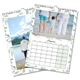 A 2026 wall calendar with a soft green leaf border design is shown open to January. The top image features a family standing barefoot at the beach, holding hands. The calendar grid below displays the month of January with clearly marked dates. Behind it, another page shows a man in a white hoodie and blue hat standing by a mountain lake with snowy peaks in the distance. The calendar is spiral-bound with a central hanging loop.