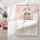 Personalised A4 pink glitter photo calendar hanging on a wall in a modern home
