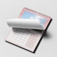 Two A4 wall calendars with pink glitter borders. One features a landscape photo of a person by a lake and mountains, and the other shows March 2025 with a photo of a parent and baby lying on a bed. Both calendars have monthly grids, spiral bindings, and hanging hooks.