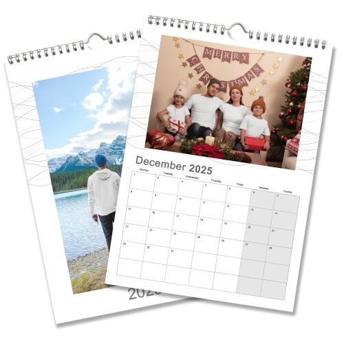 An A4 photo calendar showing January. One image features a family holding hands on a beach, and the other shows a child holding a baby. The calendar is spiral-bound with space for your images above each month.