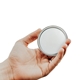 An open hand holding a personalied pocket mirror