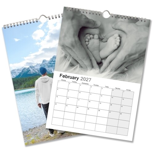 Two personalised A3 wire-bound calendars featuring a baby-feet photograph, February 2027 grid and mountain scene.