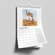Personalised A3 August 2027 wall calendar featuring two children sitting together on hay.
