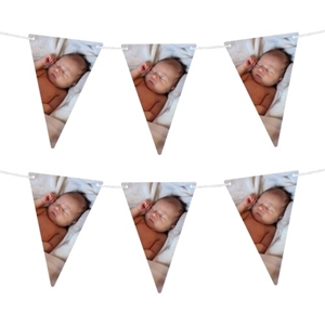 Personalised bunting featuring an image of a sleeping baby on soft white blankets, with triangular flags strung along a line. Ideal for celebrating newborn arrivals or baby showers.