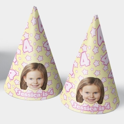 Two customised party hats with a white background, personalised with your photo and number of your choice. The hats are displayed upright side by side. Perfect for birthdays or celebrations.