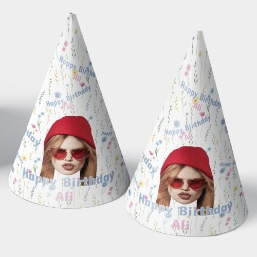 Two customised party hats with a white background, personalised with your photo and number of your choice. The hats are displayed upright side by side. Perfect for birthdays or celebrations.