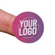 A personalised 25mm round sticker with a custom logo in pink and purple, held on the tip of a finger. The small size makes it ideal for branding, packaging, or sealing envelopes. Printed on high-quality adhesive material.