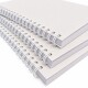 white note book with spiral bound