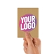 Hand holding a rectangular kraft label with a ribbed texture, featuring a personalised design with the text Your Logo in bold pink and white. Ideal for customised branding on various products.