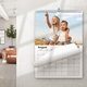 Personalised A3 August 2027 wall calendar featuring two children sitting together on hay.