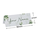 Personalised wedding place card with your name in elegant design on folded white cardstock. Dimensions are 90mm wide by 37mm high, shown with measurement indicators on a plain white background.