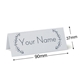 Personalised wedding place card with your name in elegant design on folded white cardstock. Dimensions are 90mm wide by 37mm high, shown with measurement indicators on a plain white background.