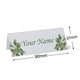 Personalised wedding place card with your name in elegant design on folded white cardstock. Dimensions are 90mm wide by 37mm high, shown with measurement indicators on a plain white background.