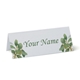 Personalised wedding place card with your name in elegant design on folded white cardstock. Minimalist design, set against a plain white background for a clean and sophisticated look.