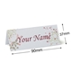 Personalised wedding place card with your name in elegant design on folded white cardstock. Dimensions are 90mm wide by 37mm high, shown with measurement indicators on a plain white background.