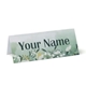 Personalised wedding place card with your name in elegant design on folded white cardstock. Minimalist design, set against a plain white background for a clean and sophisticated look.