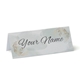 Personalised wedding place card with your name in elegant design on folded white cardstock. Minimalist design, set against a plain white background for a clean and sophisticated look.